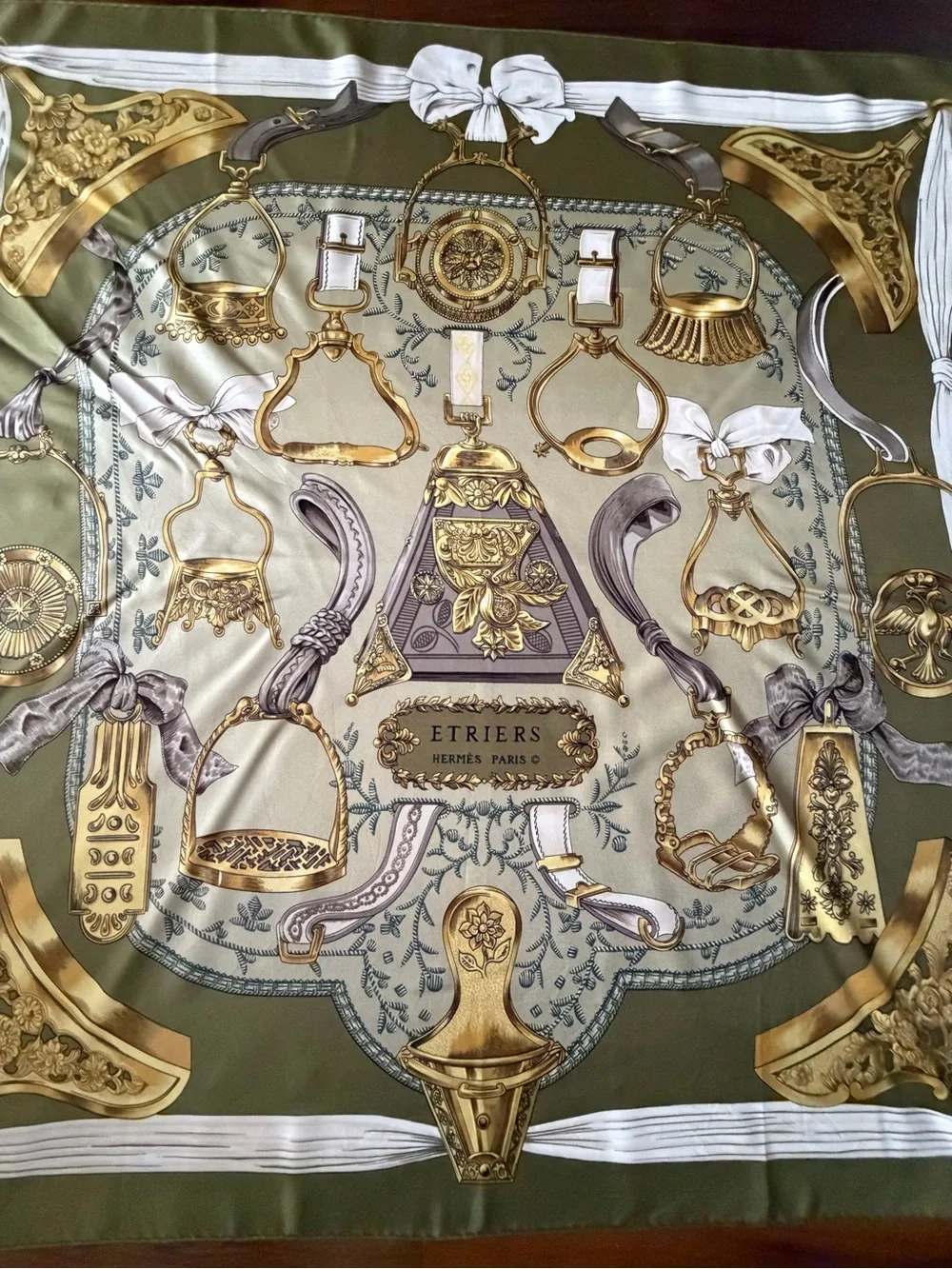 Hermes Etriers Silk Scarf with Gold Equestrian Hardware Print in Olive and Cream - Picture 1 of 16